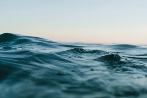 Clear turquoise seawater with gentle surface ripples