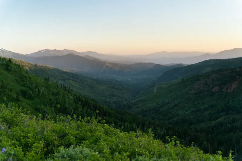 A green mountain valley in early light
