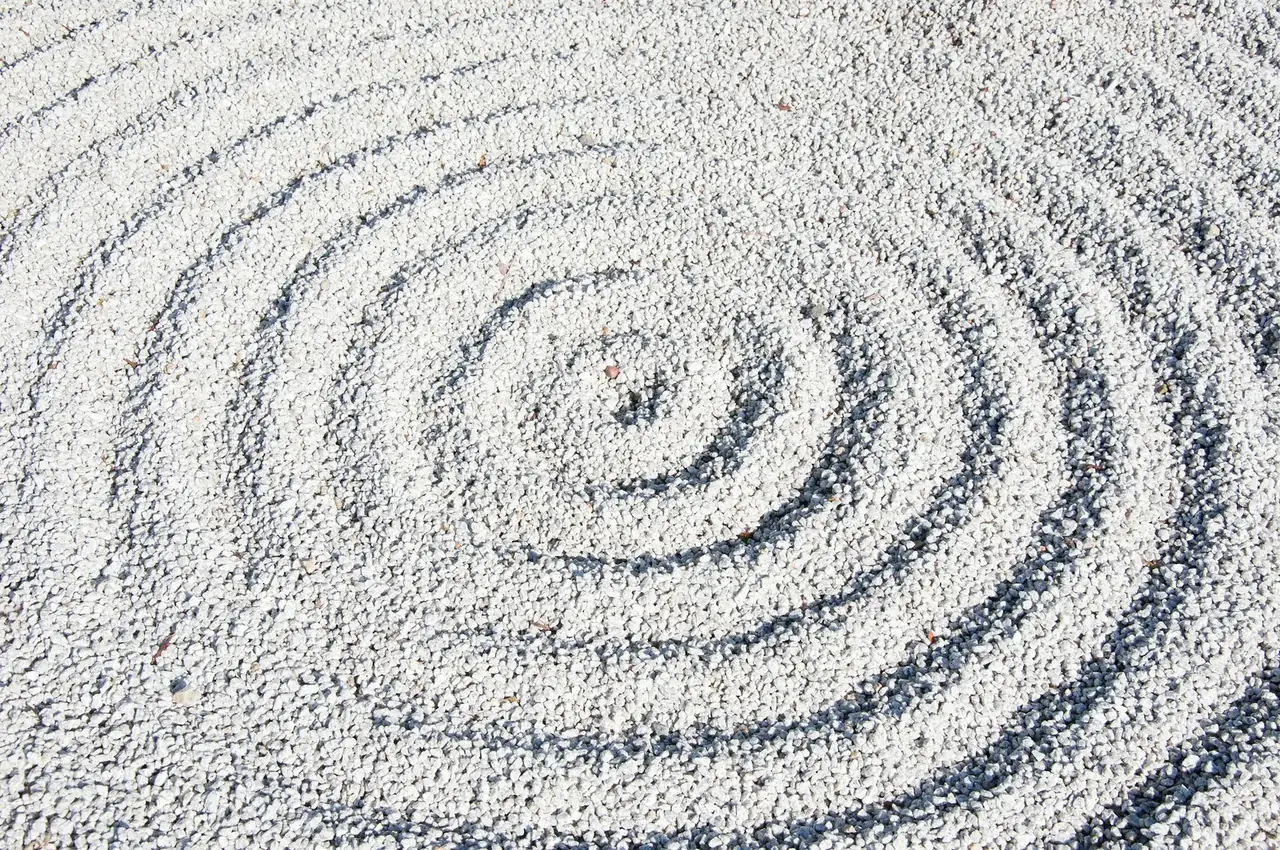 Concentric circles raked into fine white sand